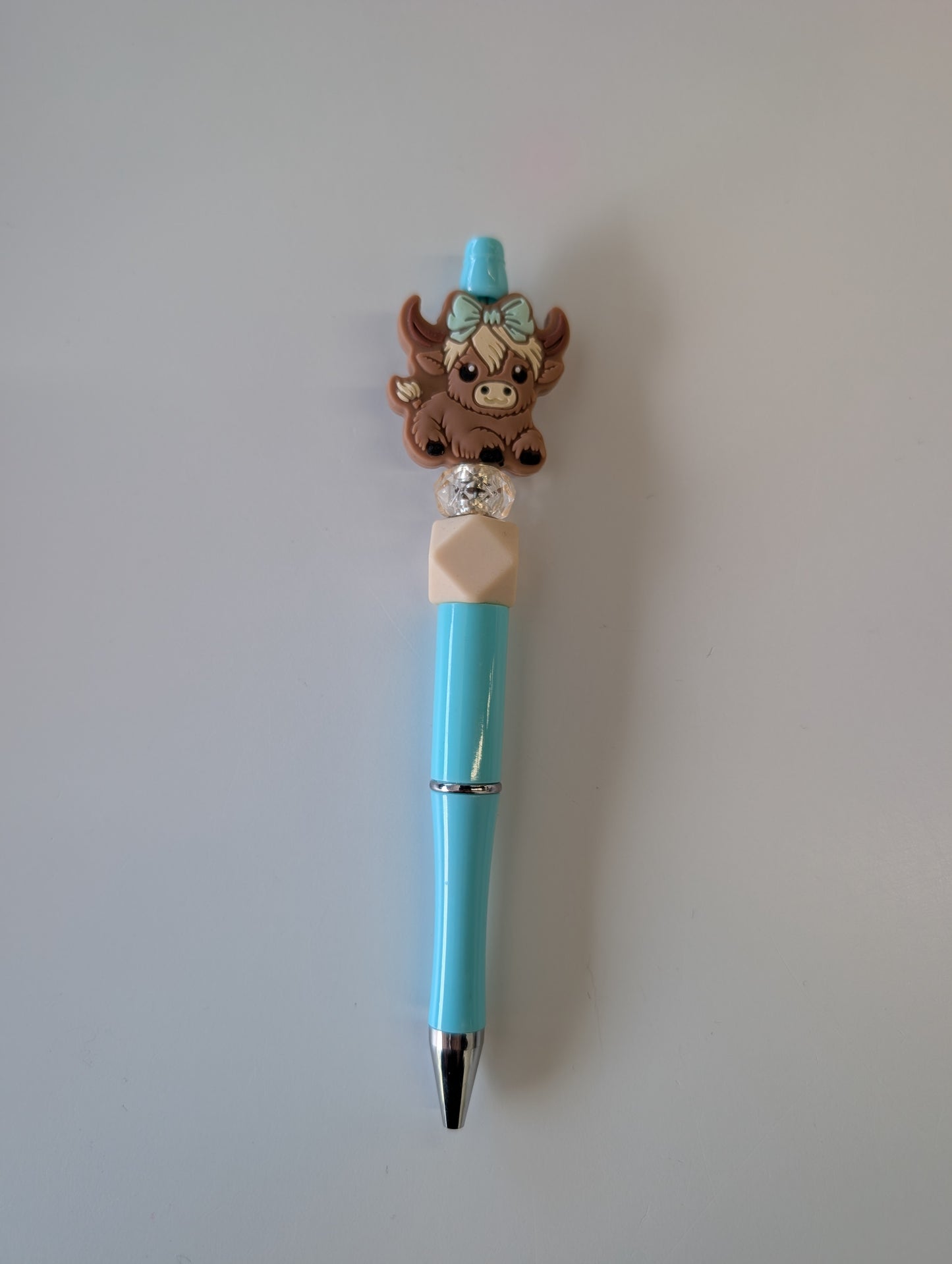 Stylo à bille vache Highland turquoise