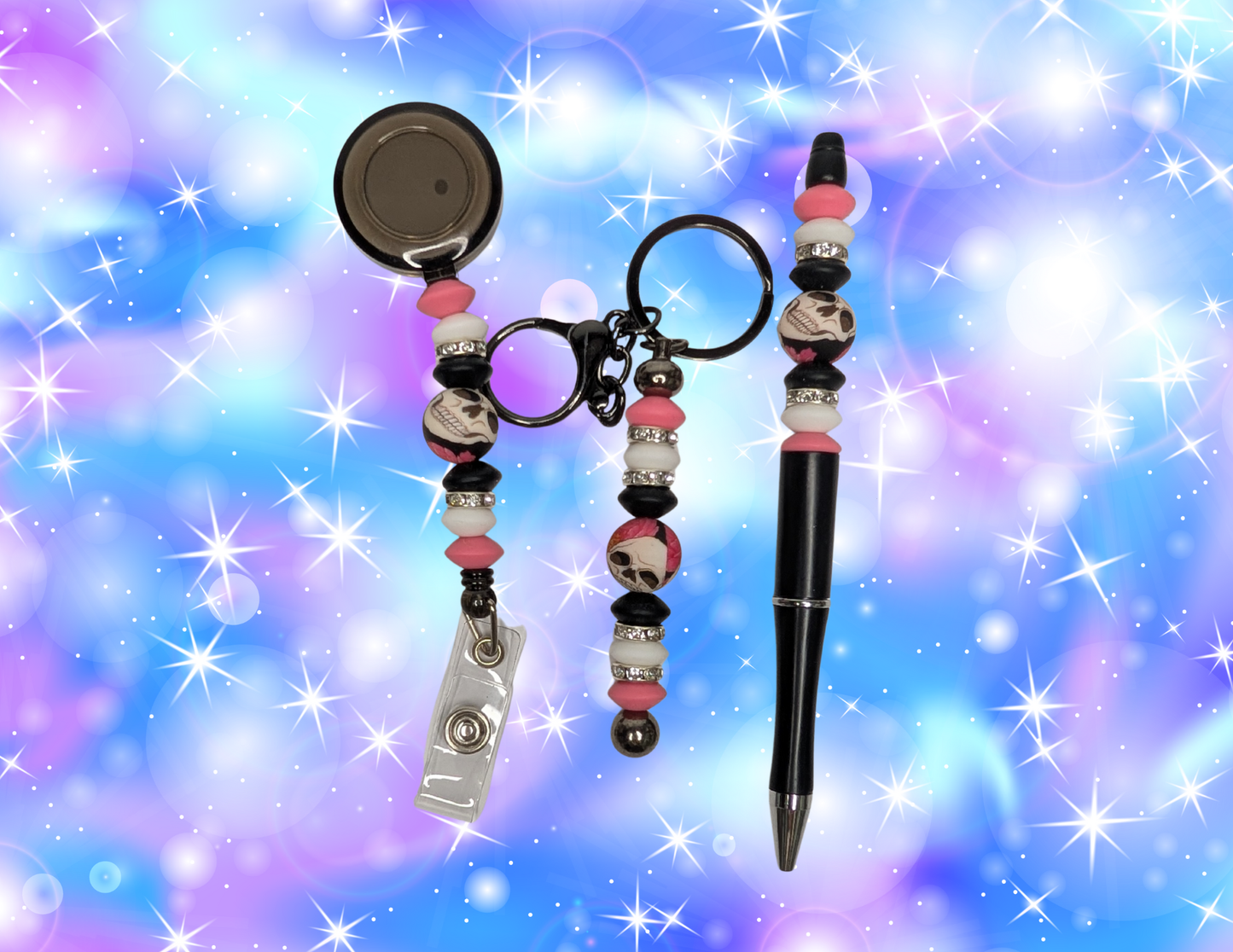 Trio porte clé, stylo, porte badge crâne