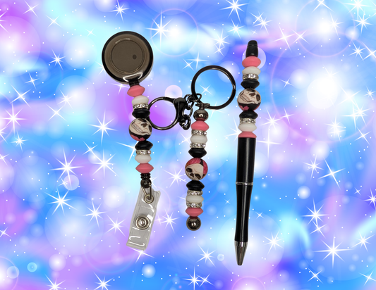 Trio porte clé, stylo, porte badge crâne